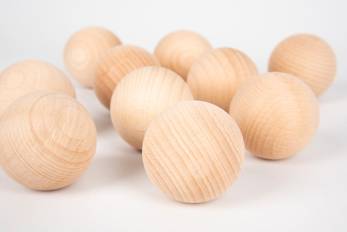 Natural wooden balls, 50mm, light wood spheres with striped grain texture.