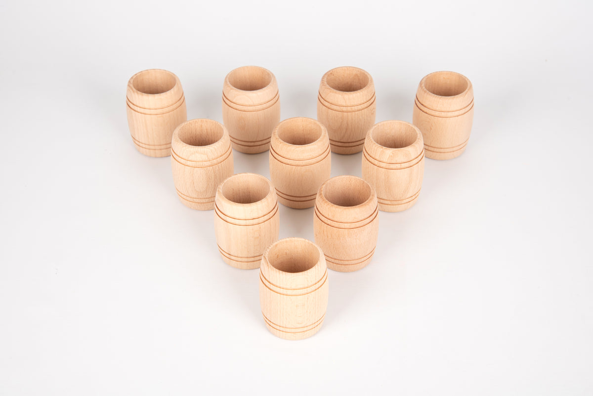 Natural wooden barrel-shaped cups arranged in a V pattern, small set
