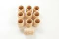 Natural wooden barrel-shaped cups with carved wood grain bands, small set