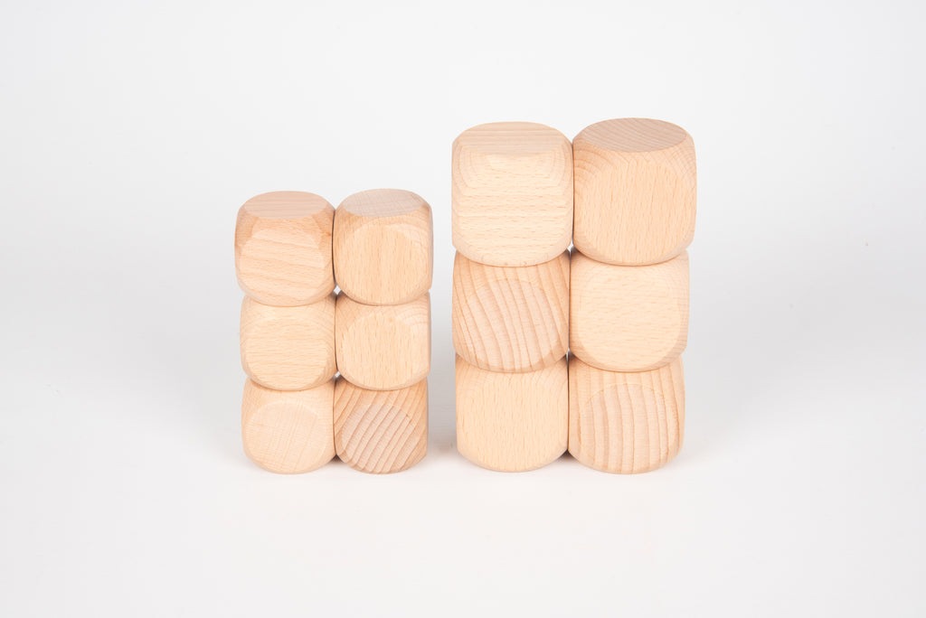 Natural light wood cube blocks, shown as two stacked column clusters