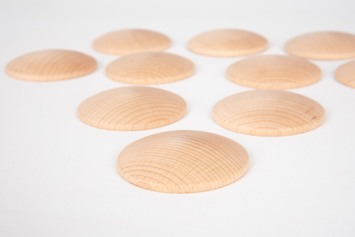 Natural wooden discs: light tan ovals with parallel wood grain lines