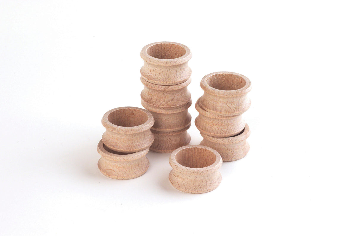 Natural wooden napkin rings, stacked set of 8 round carved rings