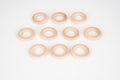 Natural wooden ring set, light pine-colored 56 mm rings arranged on a white surface