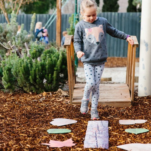 Footstep activity play set with cutout stepping stones and colorful card pieces