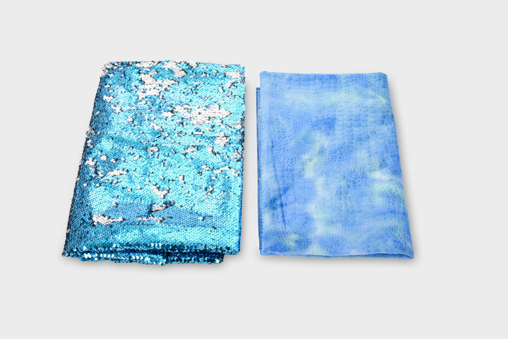 Blue textile duo: folded sequin fabric and matching sheer gauze scarf pieces