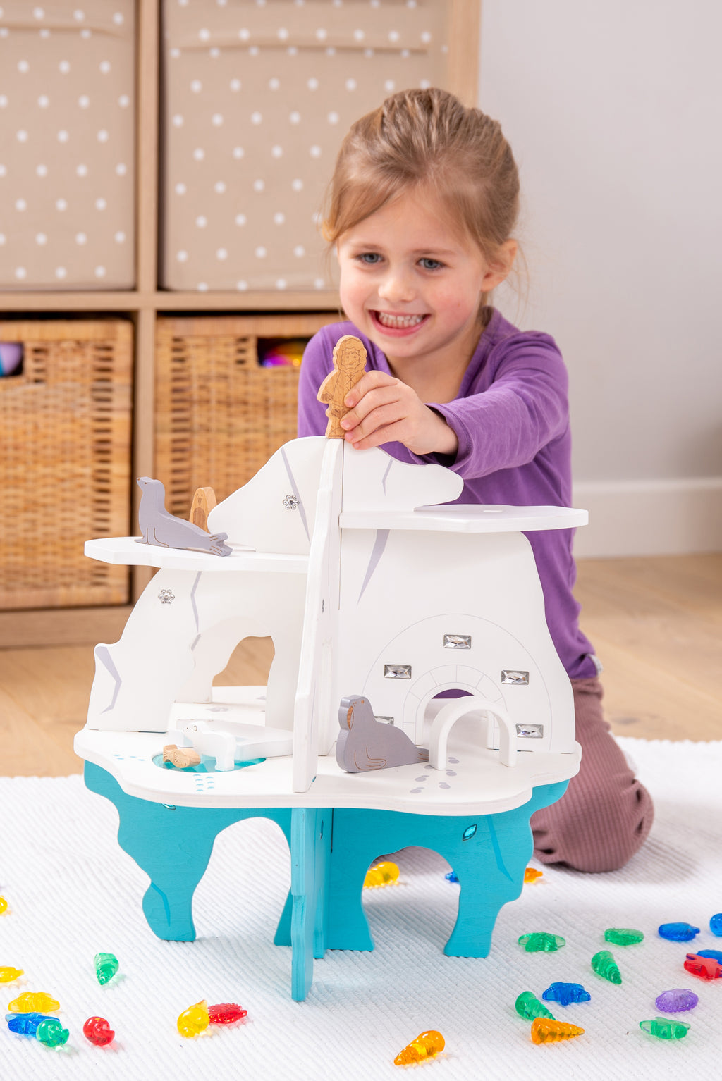 White and blue toy boat playset with molded cabin windows and side panels