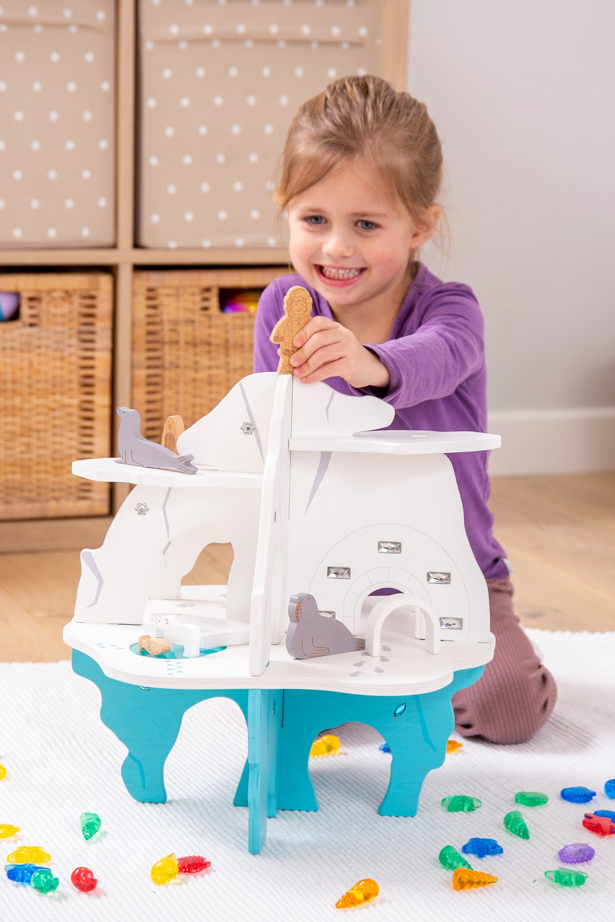White and blue toy boat playset with molded cabin windows and side panels