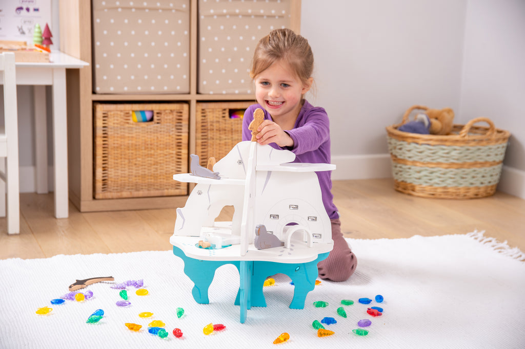 White and blue toy boat playset with open deck and accessory accessories