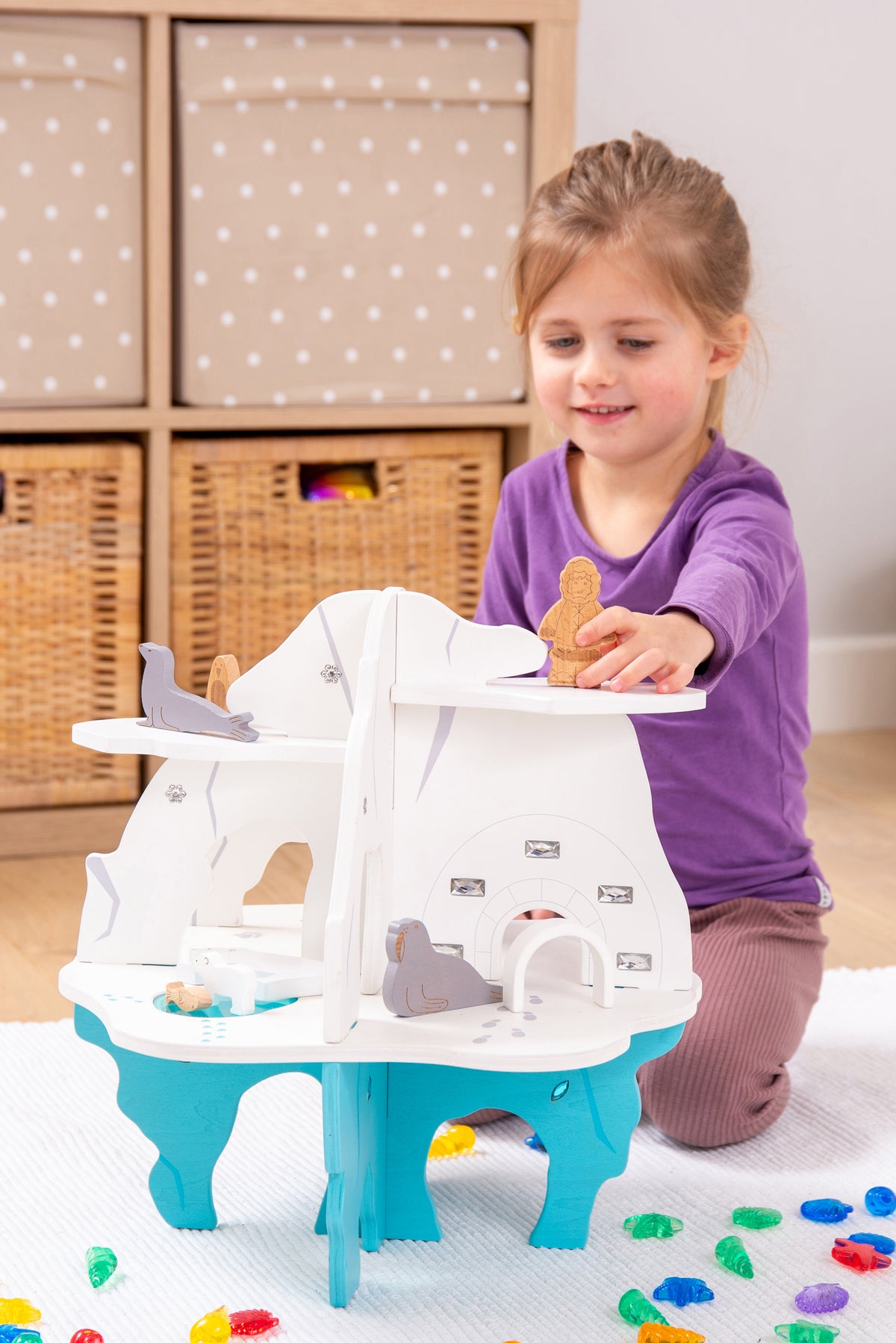White and blue toy boat playset with side panels and cockpit details