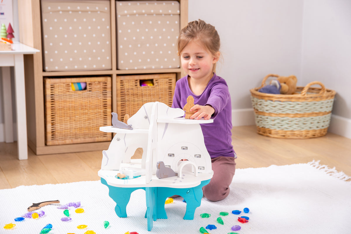 White and blue playset boat with top deck and molded animal figures