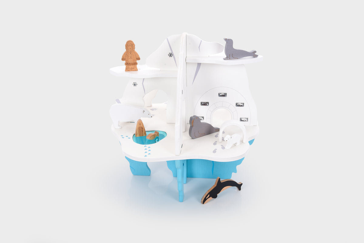 White and blue playset boat with steering console and small accessory pieces