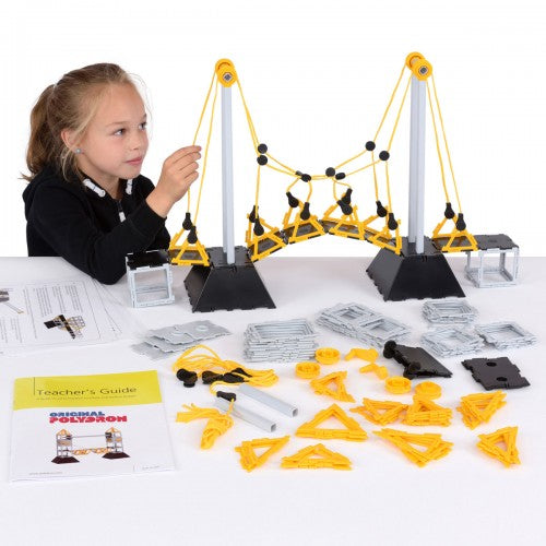Yellow and black bridge construction set with arched frame pieces and instruction guides