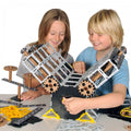 Engineering construction set with gray frame, gears, and black base plates for building models