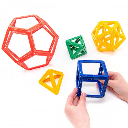 Plastic Platonic solids framework set of colorful interlocking polygon frames, held in hand
