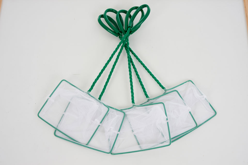 Pond net with green rope and clear mesh panels, folded for storage