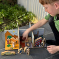 Wooden play set with castle and bus pieces and small figurines, for pretend play