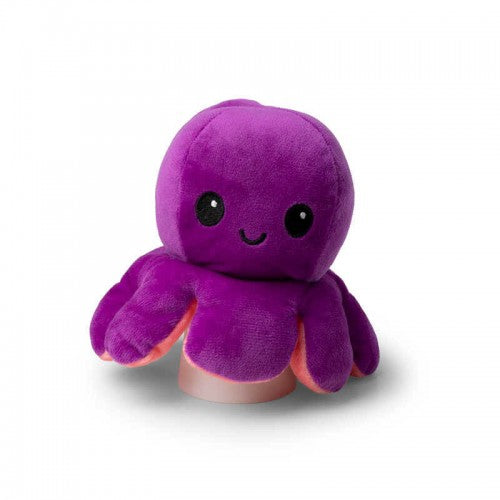 Reversible octopus plush toy, purple plush with orange-pink tentacle accents and stitched face