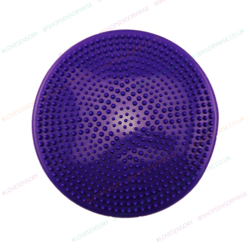 Gymnic balance wobble cushion with purple studded surface