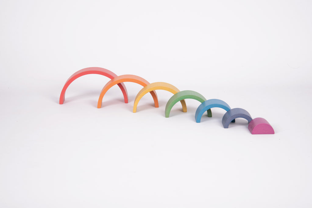Rainbow arch toy set with multiple curved arches in red to purple and dark base pieces