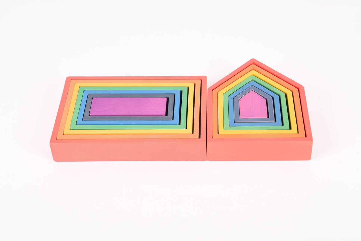 Rainbow arch house blocks with stacked colored frames on orange bases