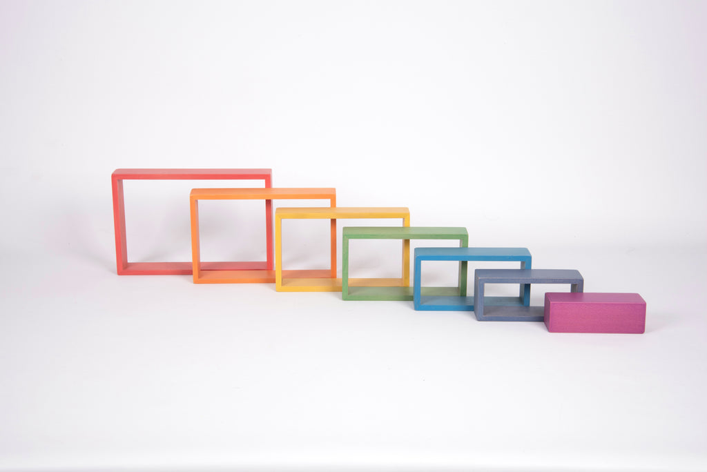 Assorted colorful rectangular frame blocks with stacked frames and a small pink piece