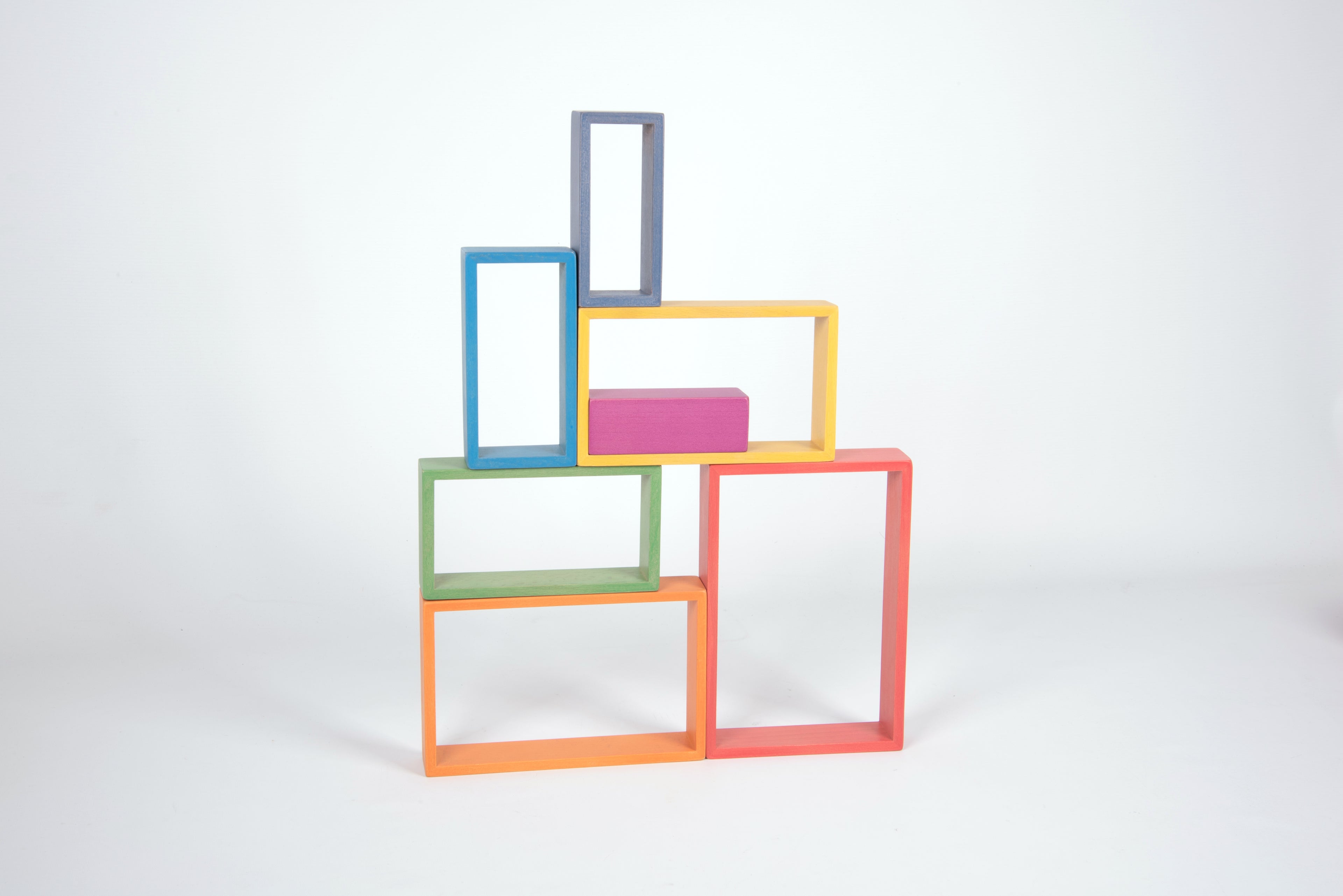 Tower of colorful rectangular frame blocks with gray, blue, yellow, and pink inserts