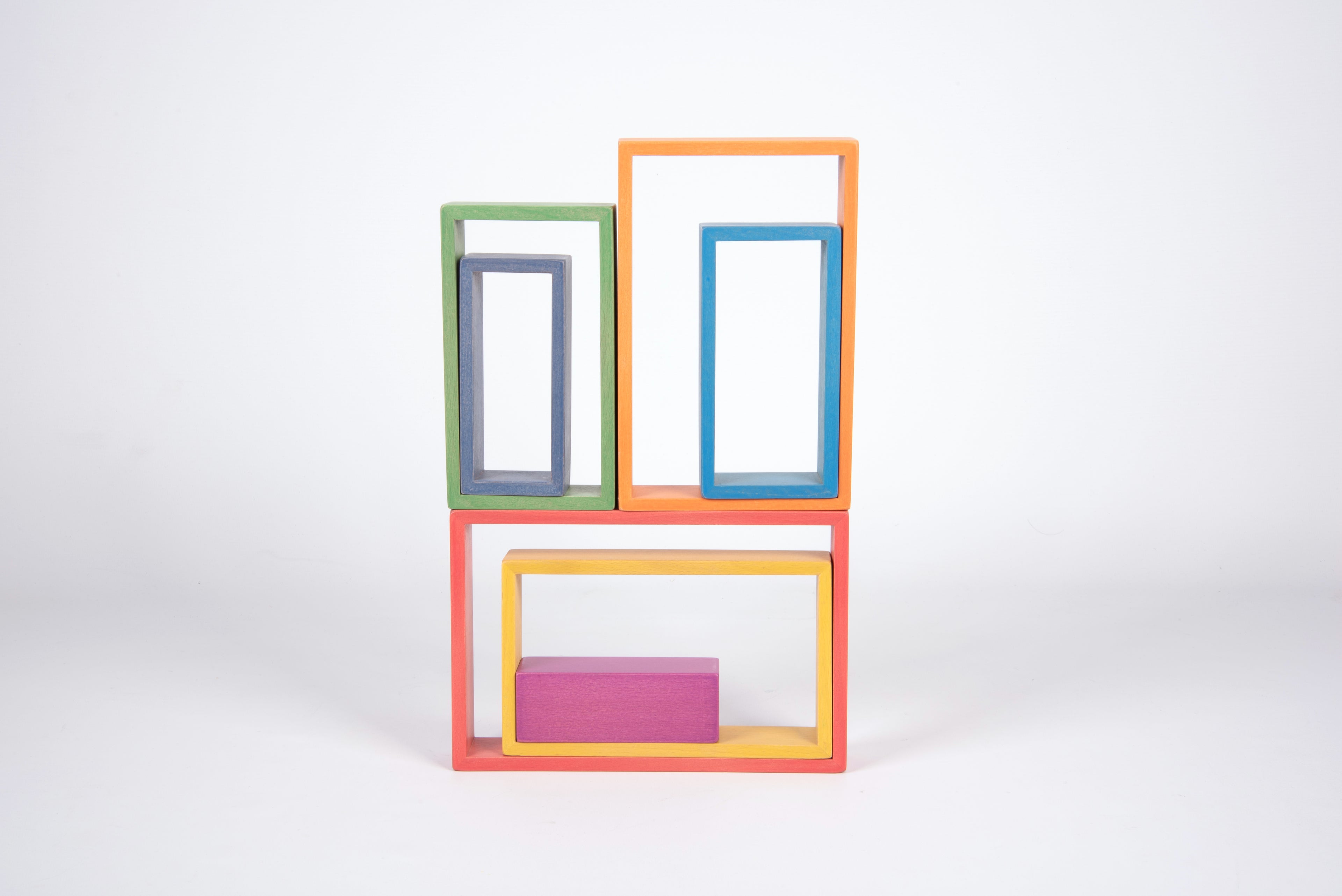 Stack of colorful rectangular frame blocks in orange, green, blue, and pink