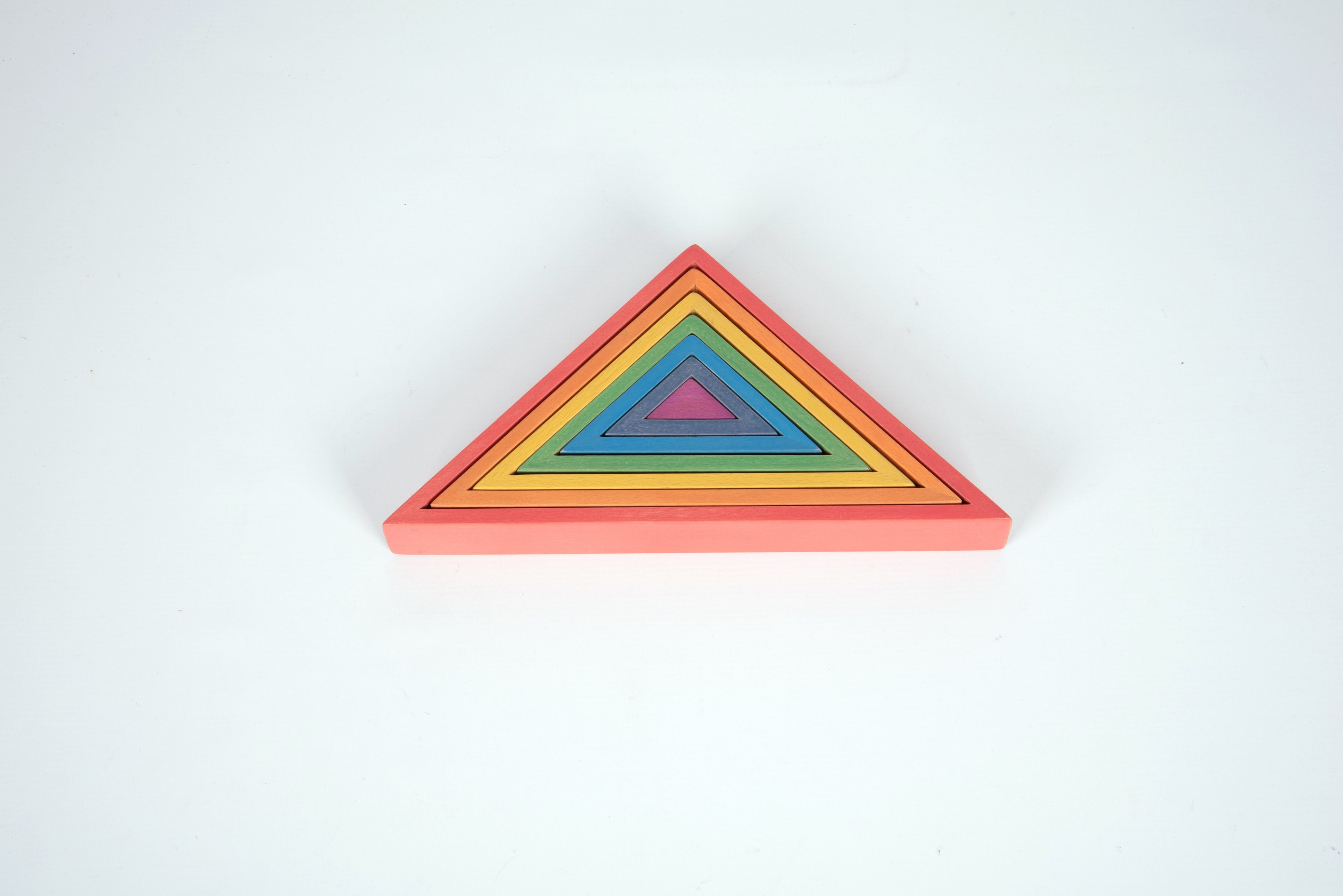 Rainbow triangle frame block, layered outlines in warm red and yellow tones.