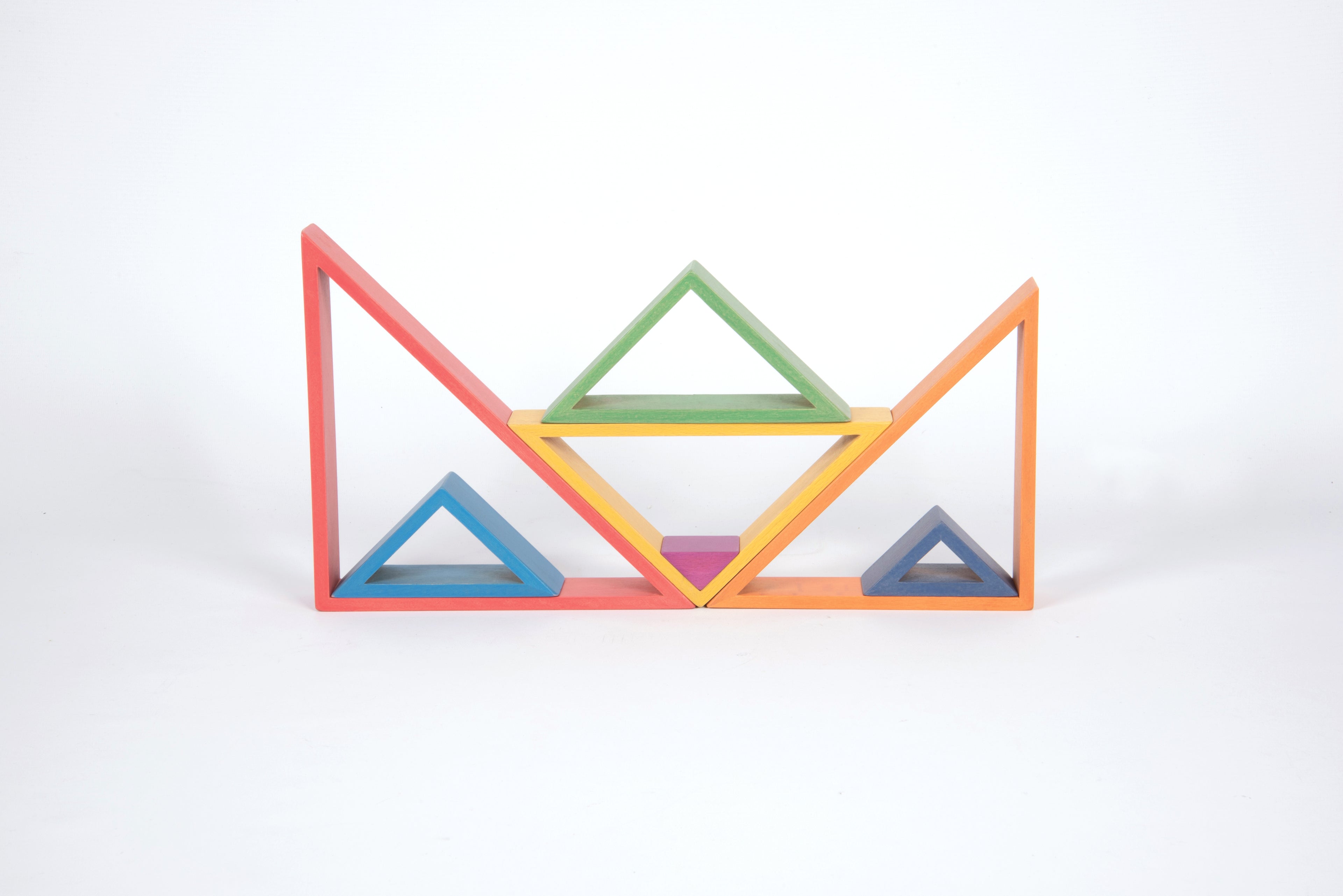 Triangle frame blocks with layered colors, side-by-side openings in red, green, and blue.