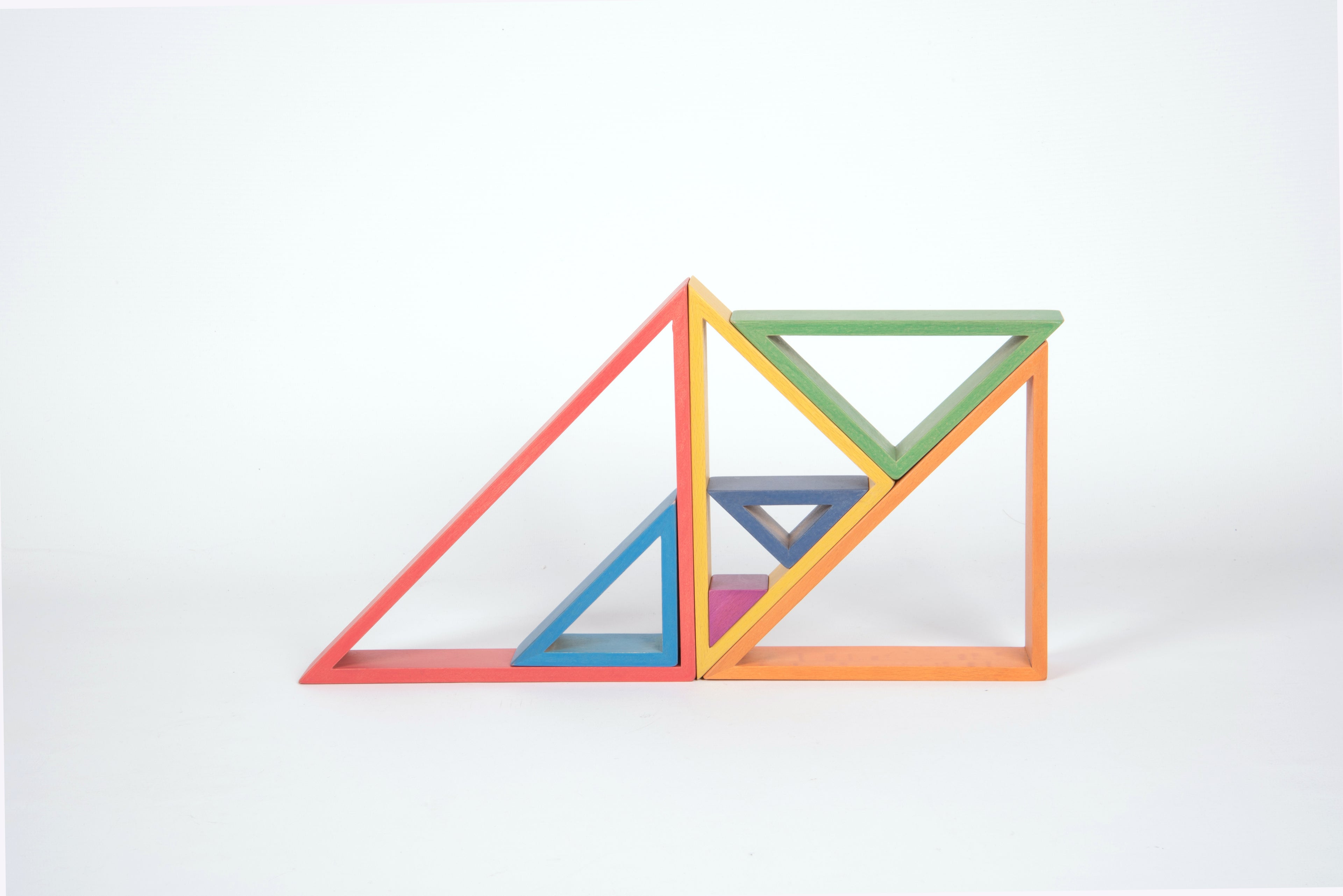 Triangle frame blocks with cutouts, multicolor outlines arranged in a doorway shape.