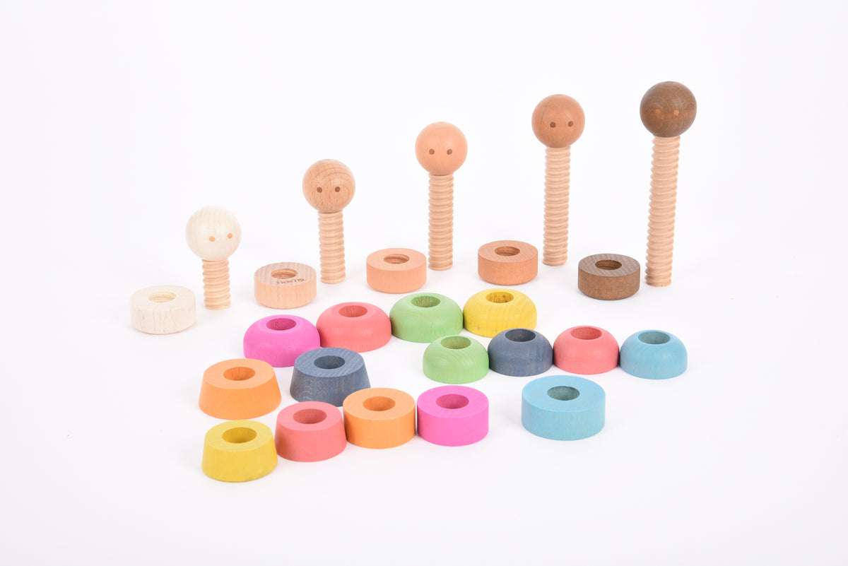 Wooden peg people and multicolor rings toy set arranged in a display