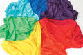 Close-up rainbow habutae fabric folds in blue, green, yellow, red, and purple
