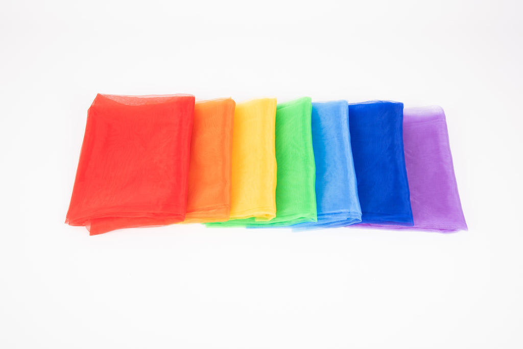 Rainbow organza fabric sheets, neatly folded stack in red, orange, yellow, green, blue and purple