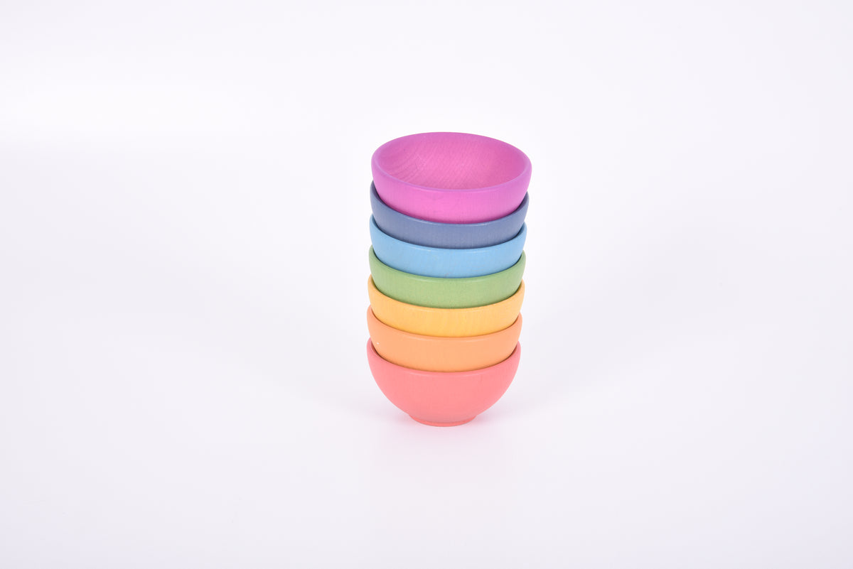 Stack of colorful kid bowls in rainbow colors