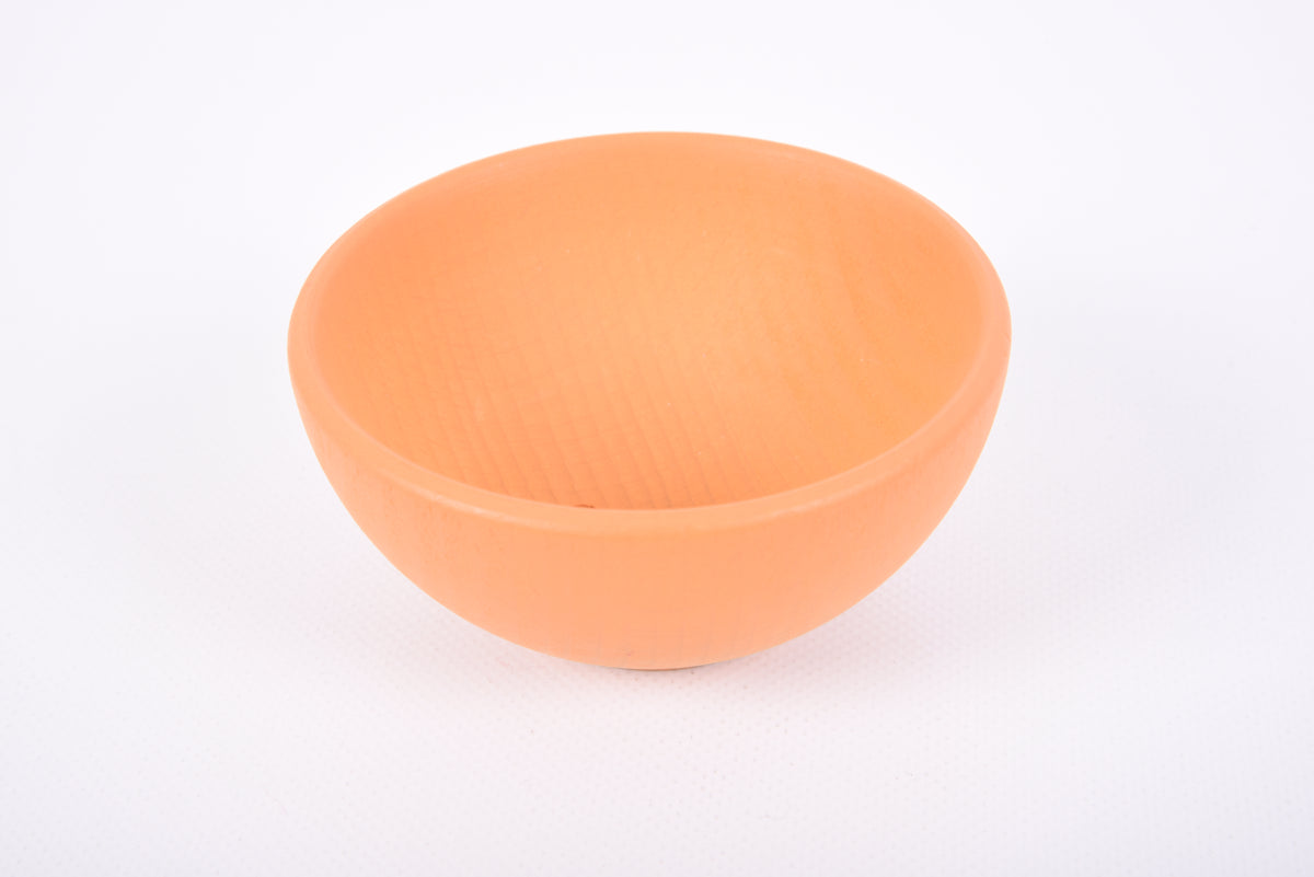 Single orange kid bowl with ridged texture on top