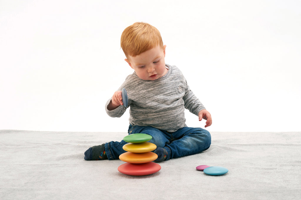 Seven rainbow wooden button disks with one stack and loose pieces, multi-color set of 7.