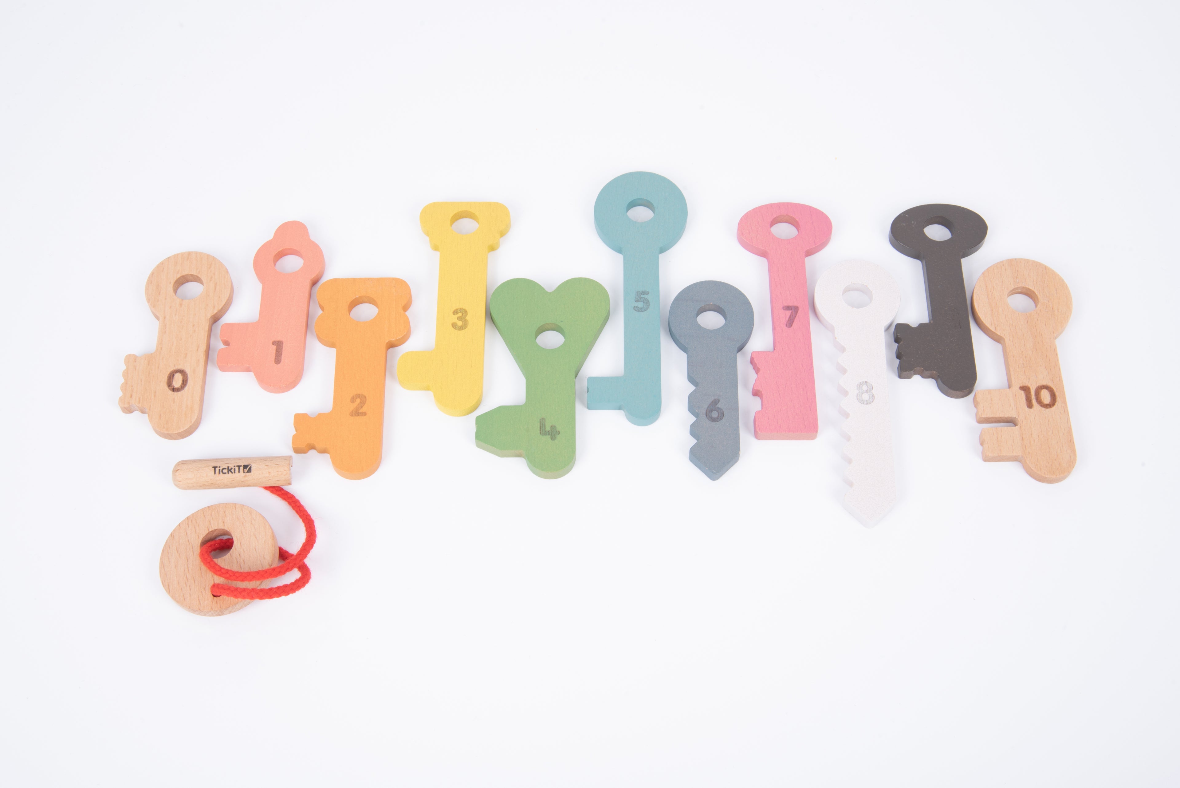 Rainbow wooden counting keys set with numbers 1–10 and red string key holder.