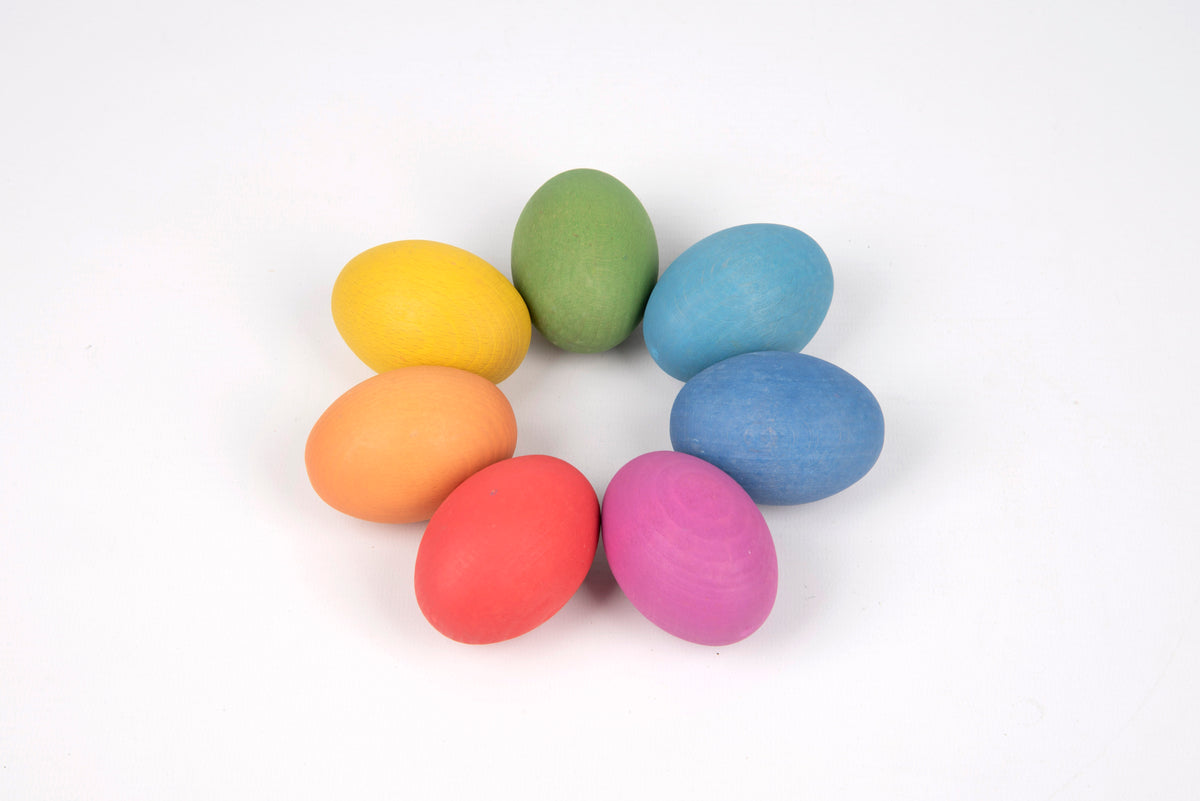 Multicolor wooden eggs, pastel yellow, green, blue, orange, red, pink, purple