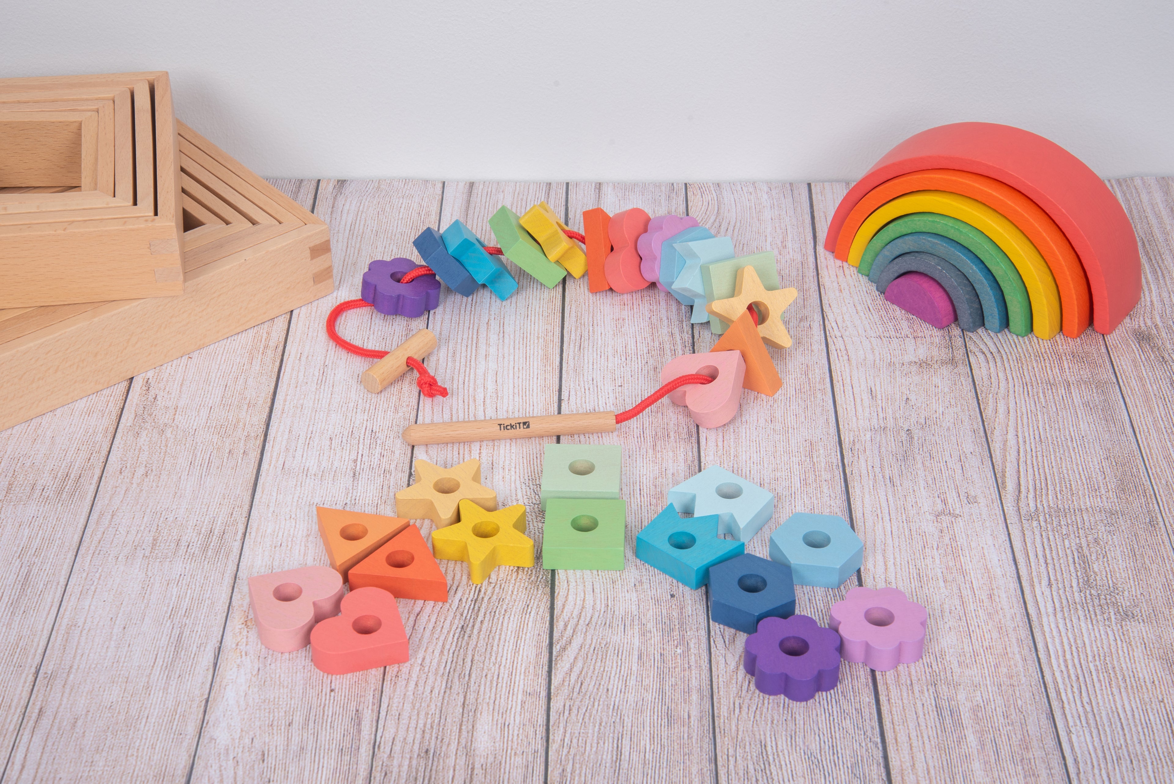 Rainbow wooden lacing shapes and wooden rainbow arch with multi-shape pieces