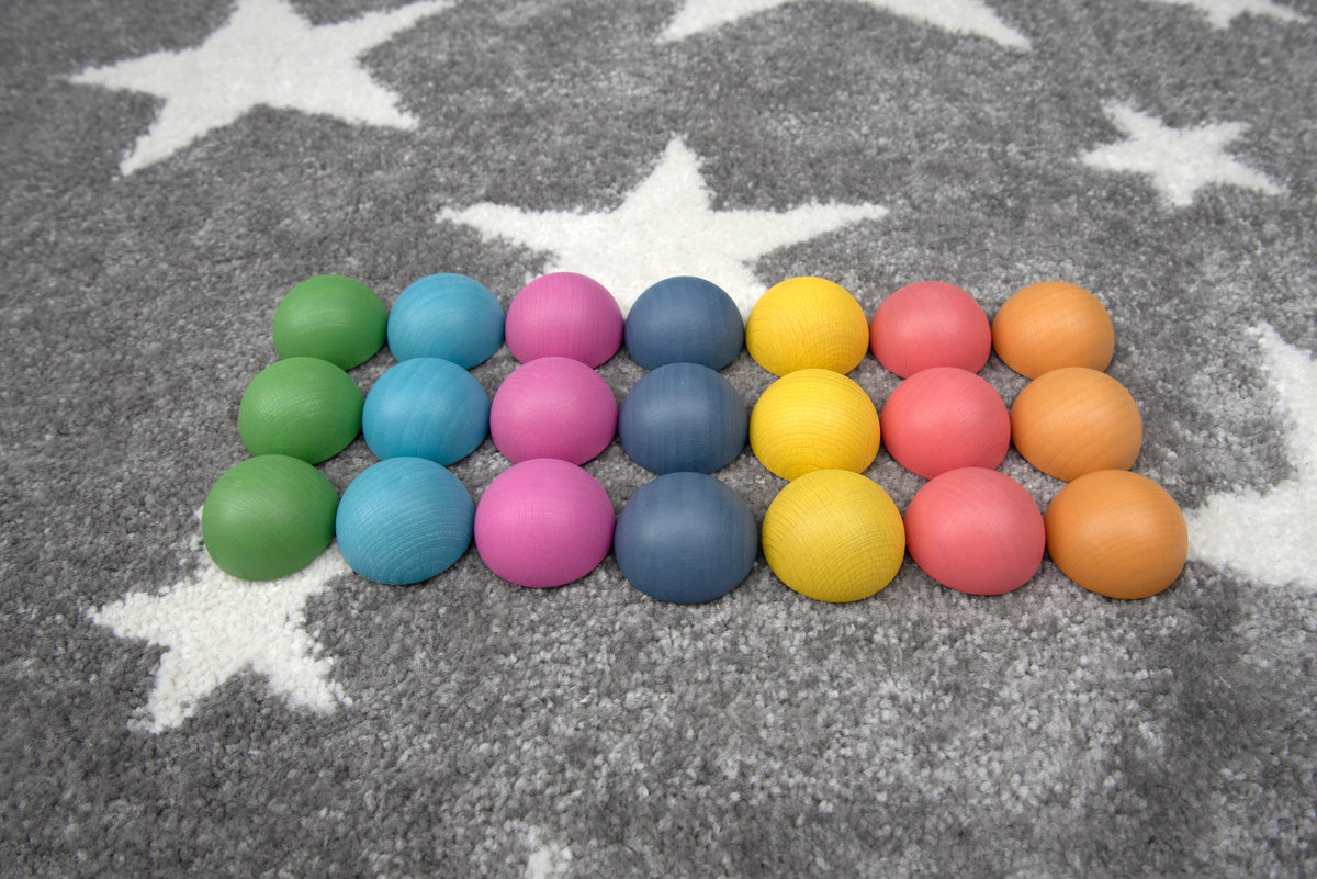 Rainbow wooden hemispheres set of multicolor semispheres in a cluster