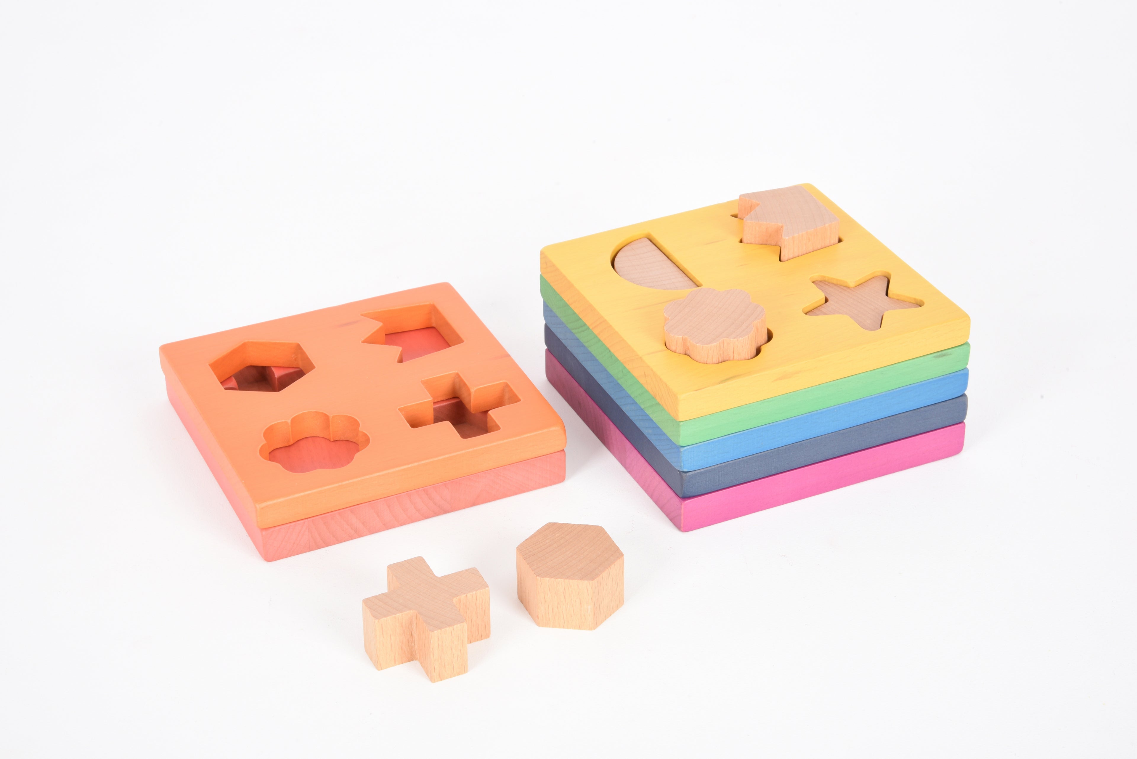 Rainbow wooden shape stacker with star, cross, and heart cutout pieces