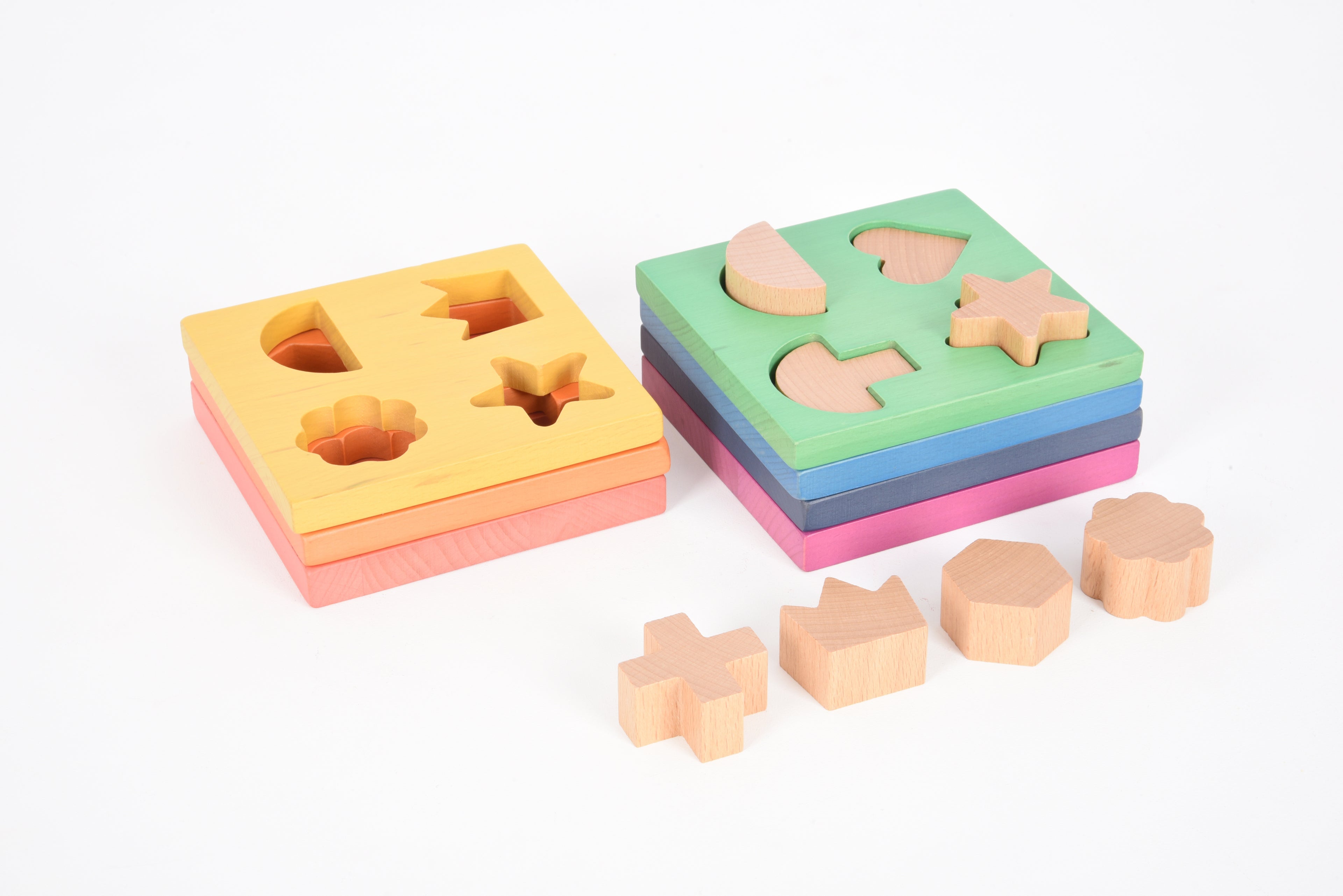 Rainbow wooden shape stacker with flower, star, and block cutout shapes