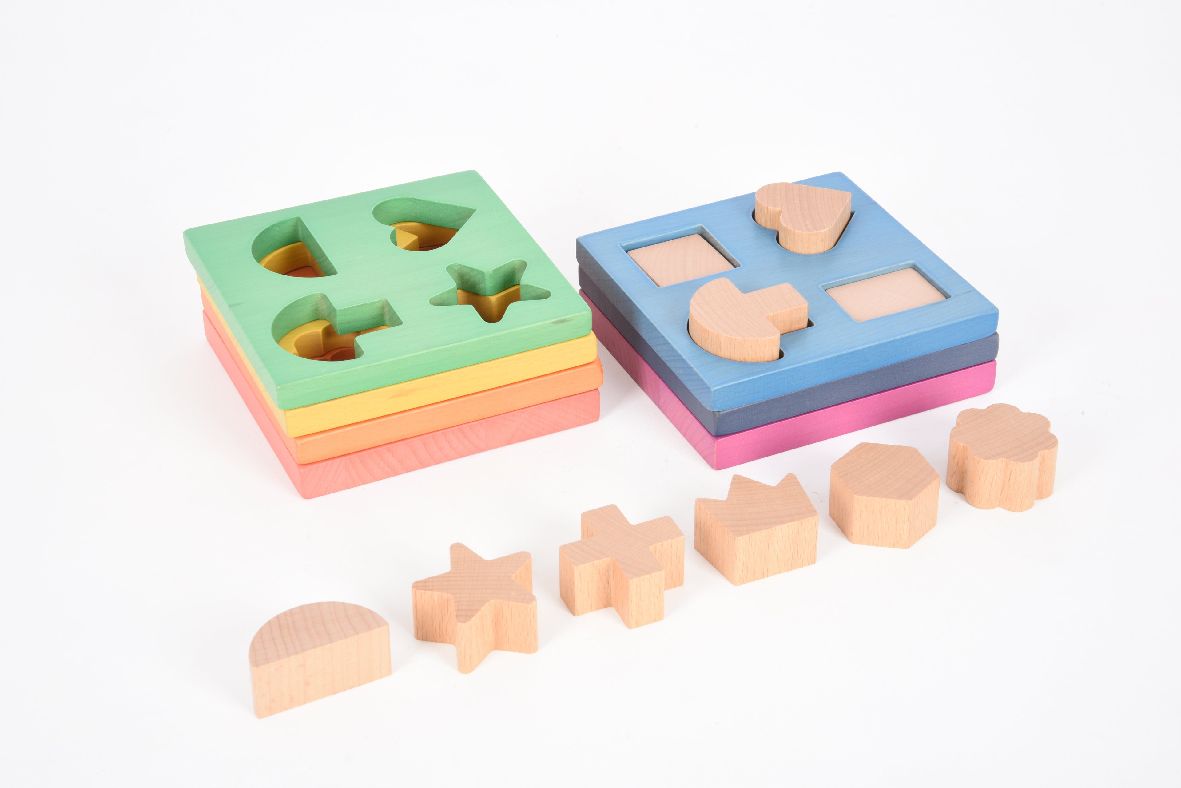 Rainbow wooden shape stacker with green and blue boards plus wooden shapes