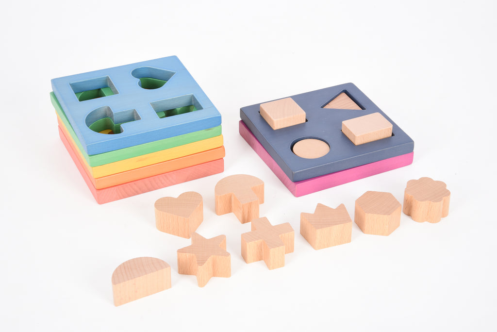 Rainbow wooden shape stacker with blue and purple boards and wooden cutout shapes