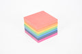 Rainbow wooden stacker boards in pink, orange, yellow, green, blue, and purple layers