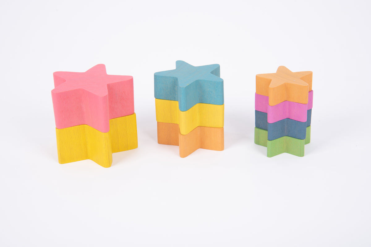 Set of three wooden star stacking blocks in rainbow colors
