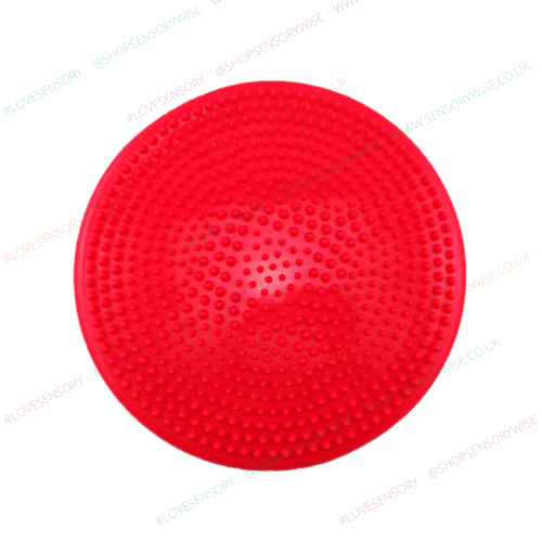Gymnic balance wobble cushion with red studded surface