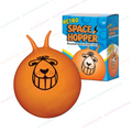 Orange inflatable space hopper ball with cartoon lion face, shown with product box