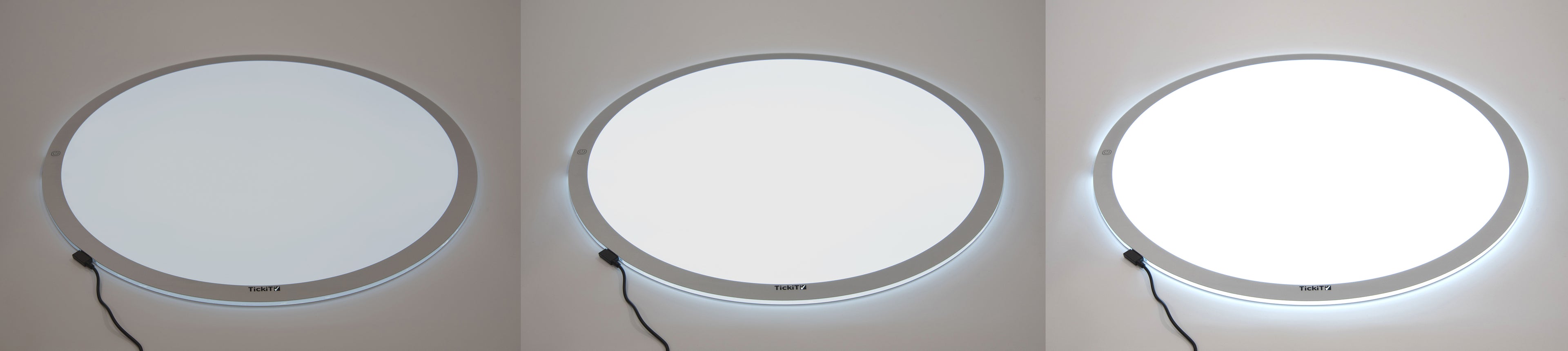 Round LED light panel with bright white circular glow and silver outer ring
