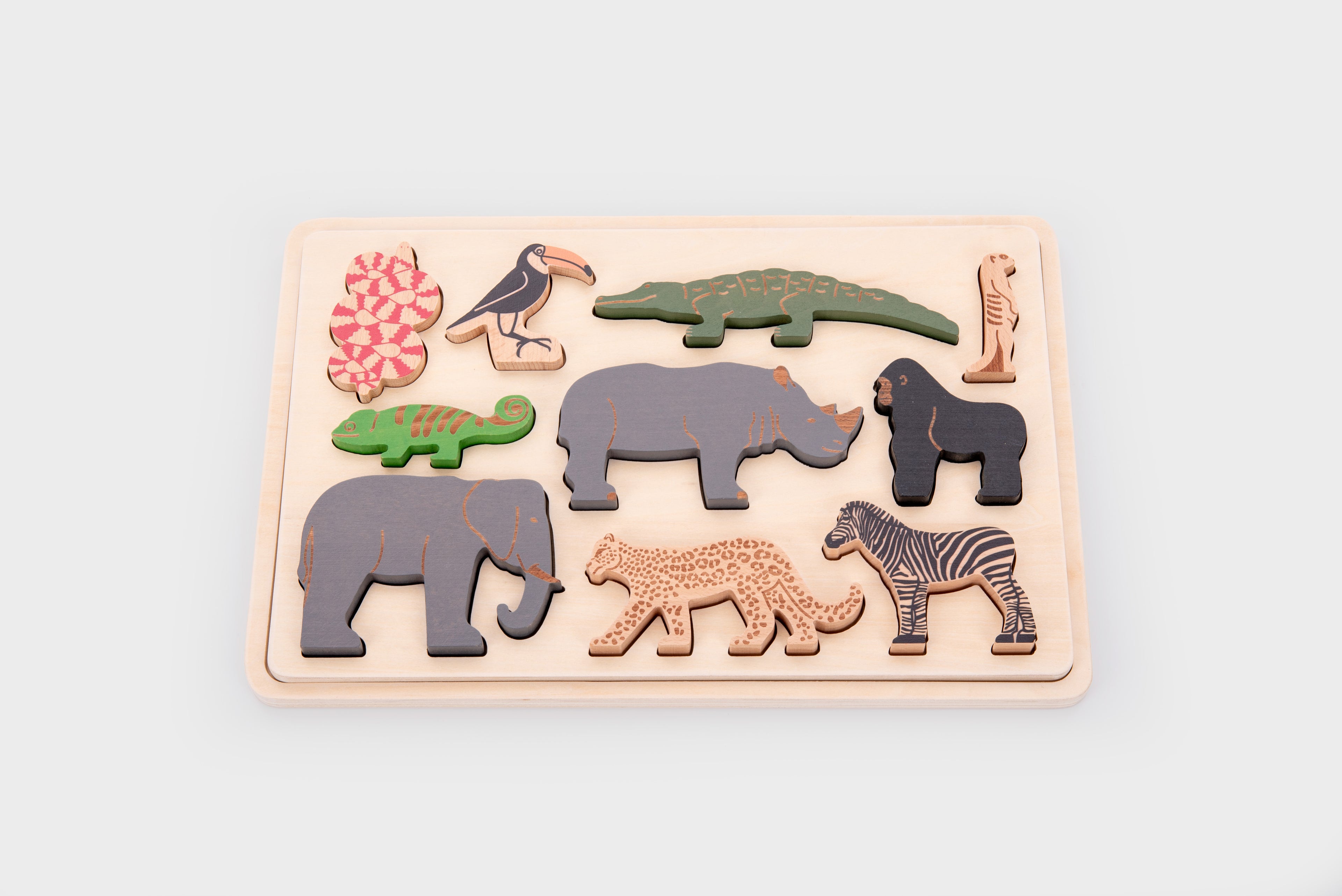 Wooden safari animal layer puzzle board with layered animal pieces arranged
